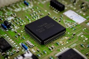 Close-up of a computer chip mounted on a printed circuit board