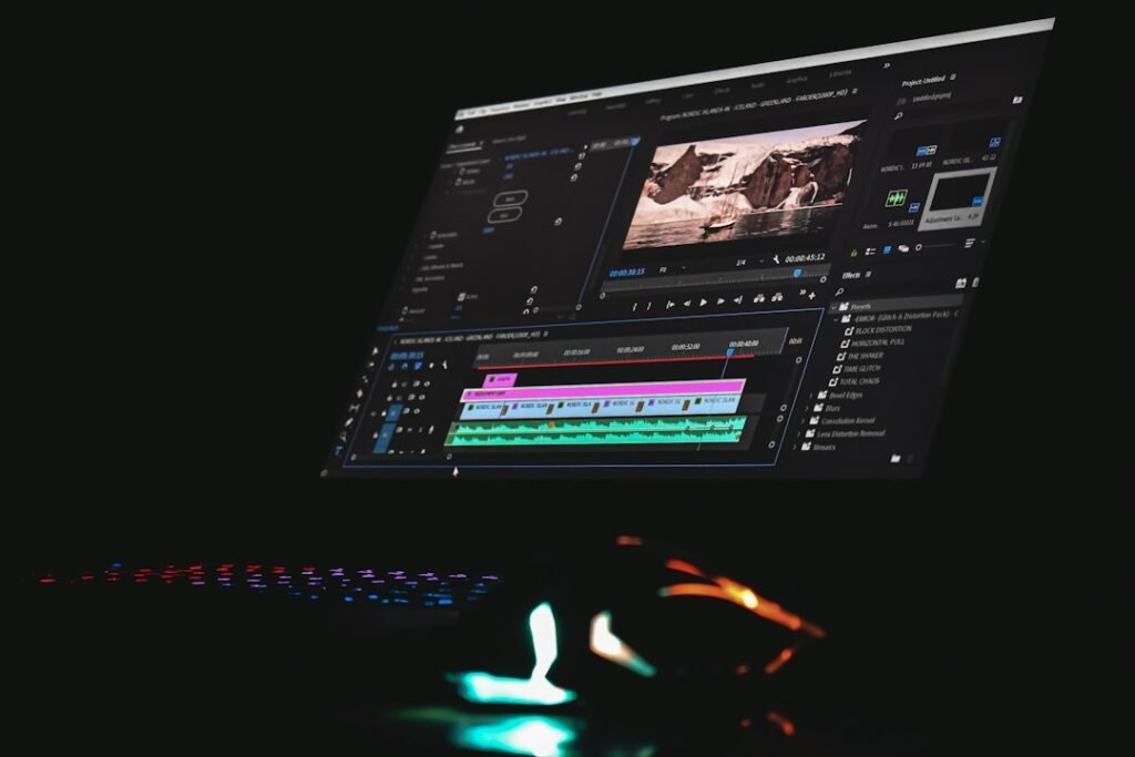 Computer monitor displaying video editing software with a timeline and preview window