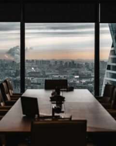 Empty corporate boardroom with city skyline view, representing enterprise AI consulting