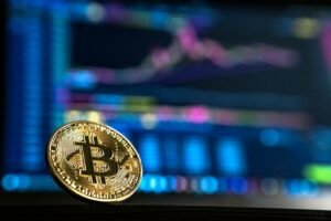Gold-colored Bitcoin coin