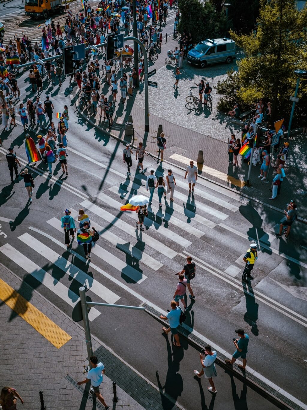 Group of people crossing a city street