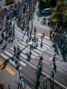 Group of people crossing a city street