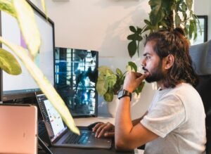 Man working online on a laptop