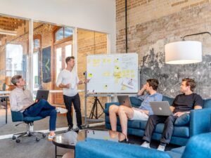 Marketing agency team discussing AI consulting strategy in a meeting