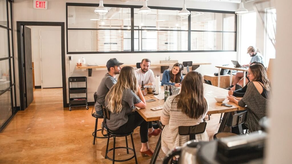 People talking while sitting at a table