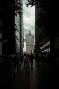 People walking between modern buildings in a city