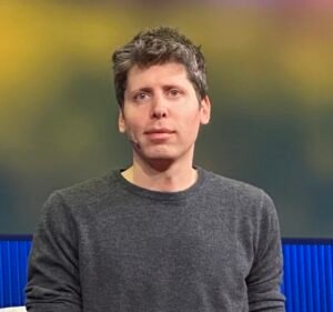 Sam Altman, CEO of OpenAI, speaking on stage