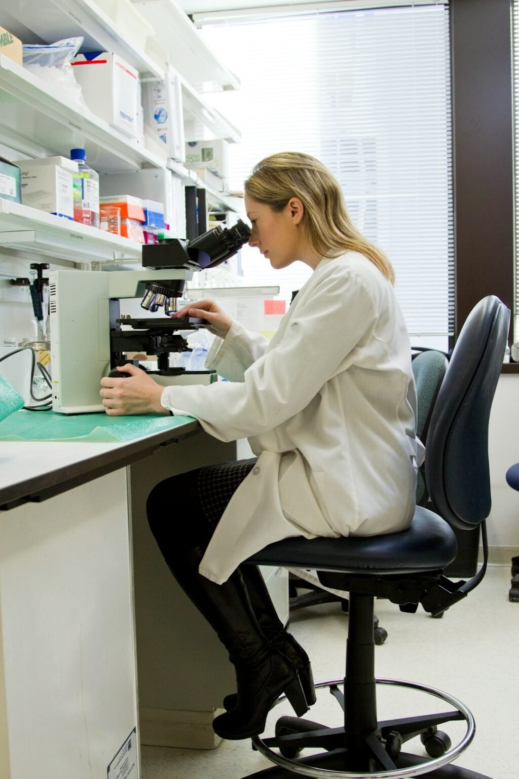 Scientist in a lab coat working in a laboratory