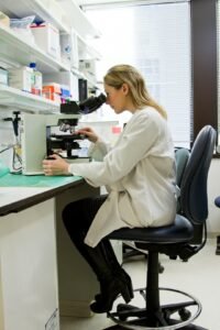 Scientist in a lab coat working in a laboratory