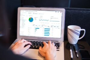 SEO specialist reviewing website analytics on a laptop