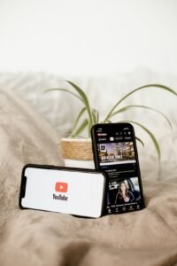 Smartphone lying next to a plant