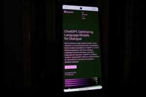 Smartphone with a lit screen in the dark