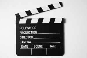 Black and white movie clapperboard, illustrating AI video creation with Grok Imagine Video 1.5 Lite