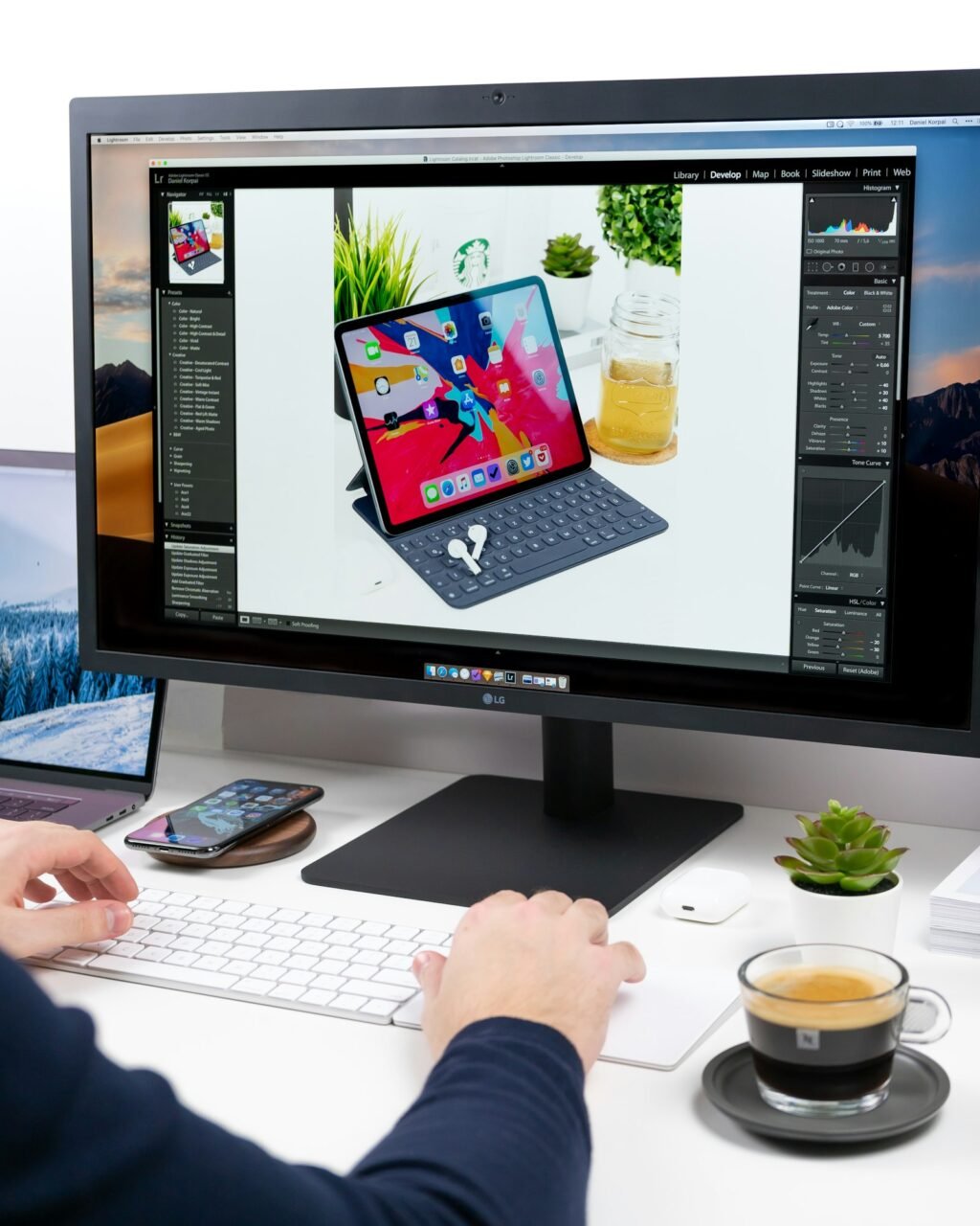 Creator at a desktop computer setup learning how to use ComfyUI for AI image generation