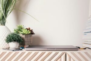 Laptop on a wooden table, illustrating an RTX Spark laptop buying guide for local AI