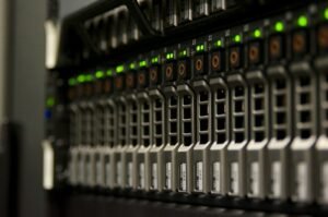 Server rack with green lights, illustrating the hardware needed to run Muse Spark Open