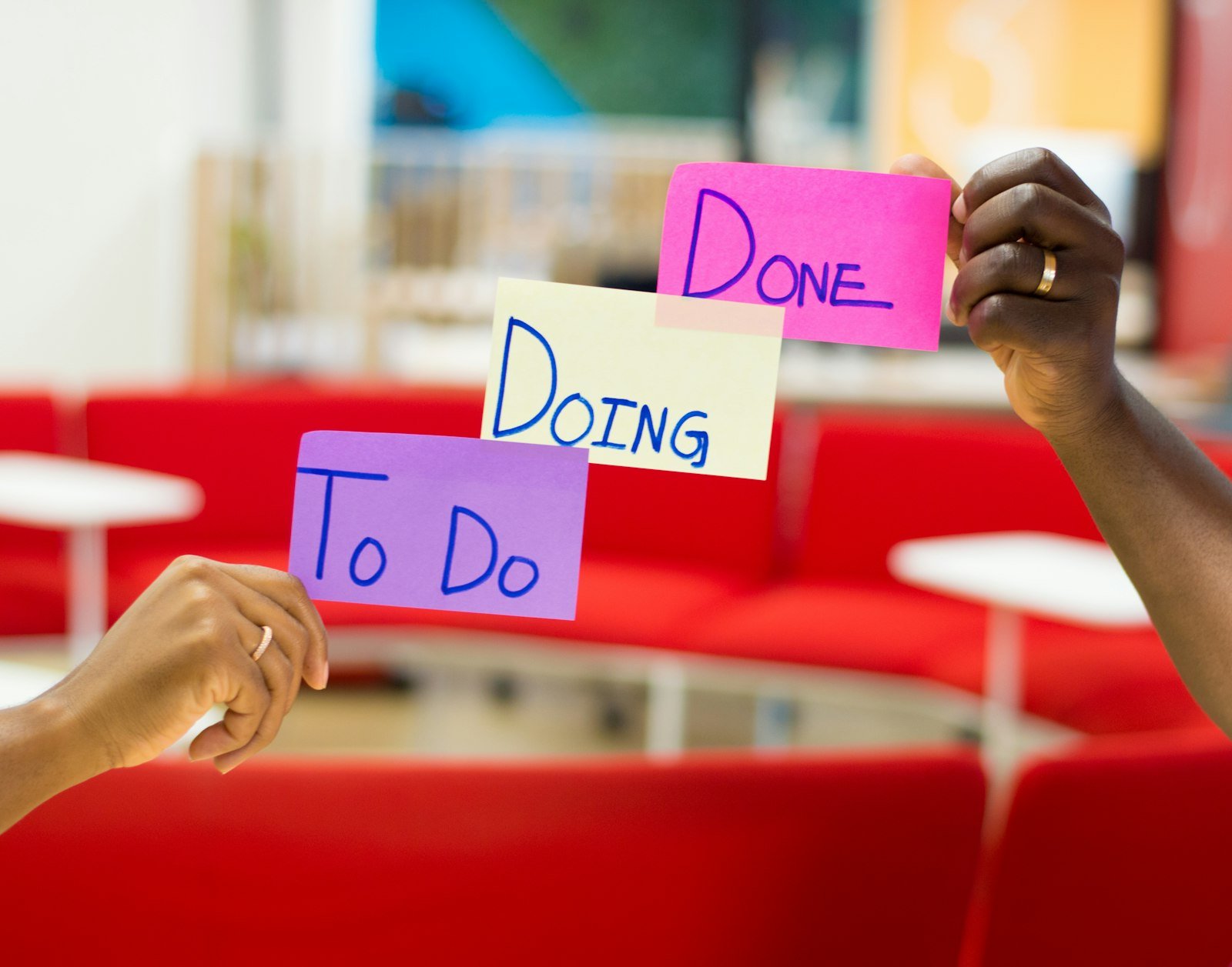 Sticky notes labelled To Do, Doing and Done, like the long-running tasks a Gemini agent tracks in its tasks inbox