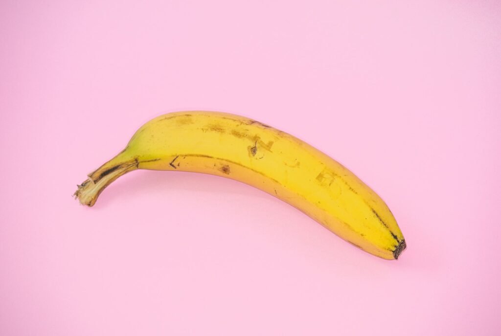 Yellow banana on a pink surface, illustrating Google's Nano Banana 2.1 image model
