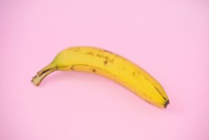Yellow banana on a pink surface, illustrating Google's Nano Banana 2.1 image model